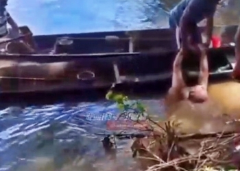 Pescadores usam canoas para resgatar banhista durante afogamento no Rio Cuiabá